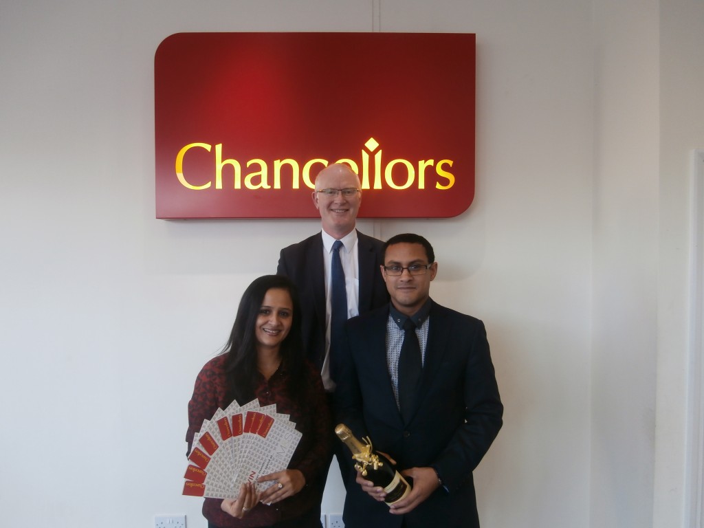 The winner, Mrs Sood, with Nic Simmonds (Area Manager) and (front right) Ian Thomas, Lettings Manager of the Chancellors High Wycombe office.